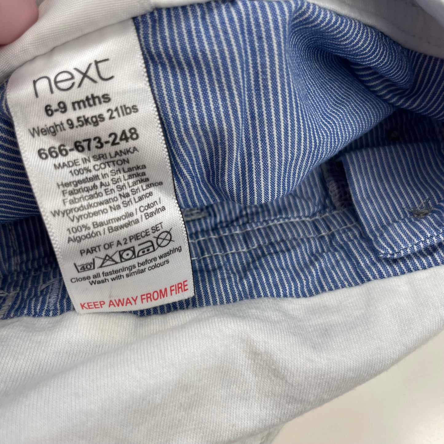 Blauer Baumwoll-Overall mit Dino-Muster für Kinder – label