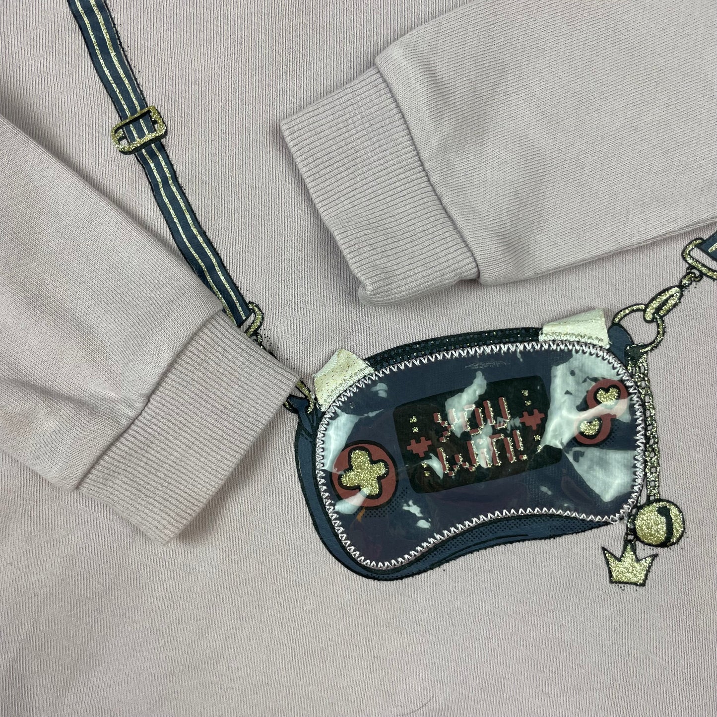 Lila Sweatshirt von name it mit Taschen-Applikation, Größe 92 – detail