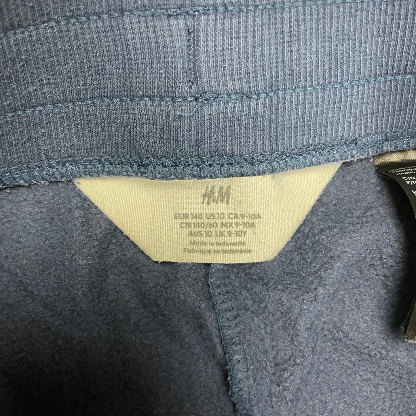 Blaue Jogginghose für Kinder mit elastischen Bündchen und Kordelzug – label