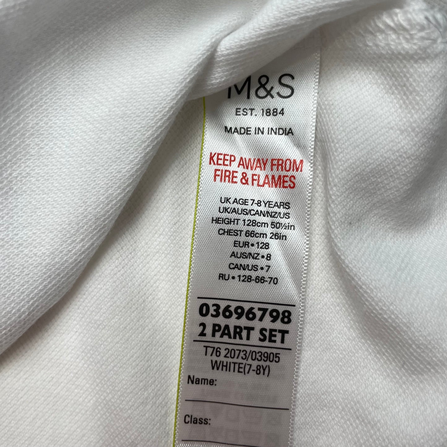 Weißes Langarm-Polohemd aus Baumwolle für Kinder – label