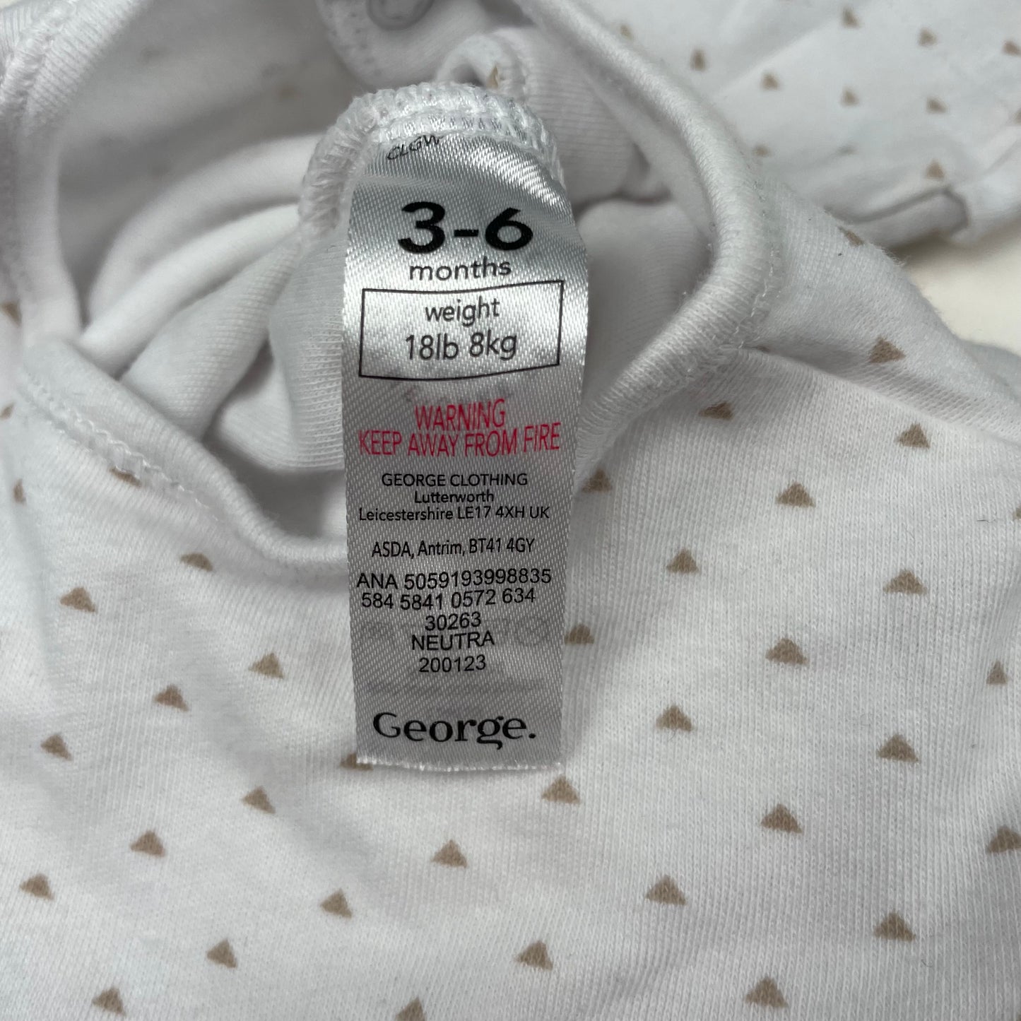 Weißer Baumwoll-Overall mit Pünktchenmuster und durchgehender Knopfleiste – label