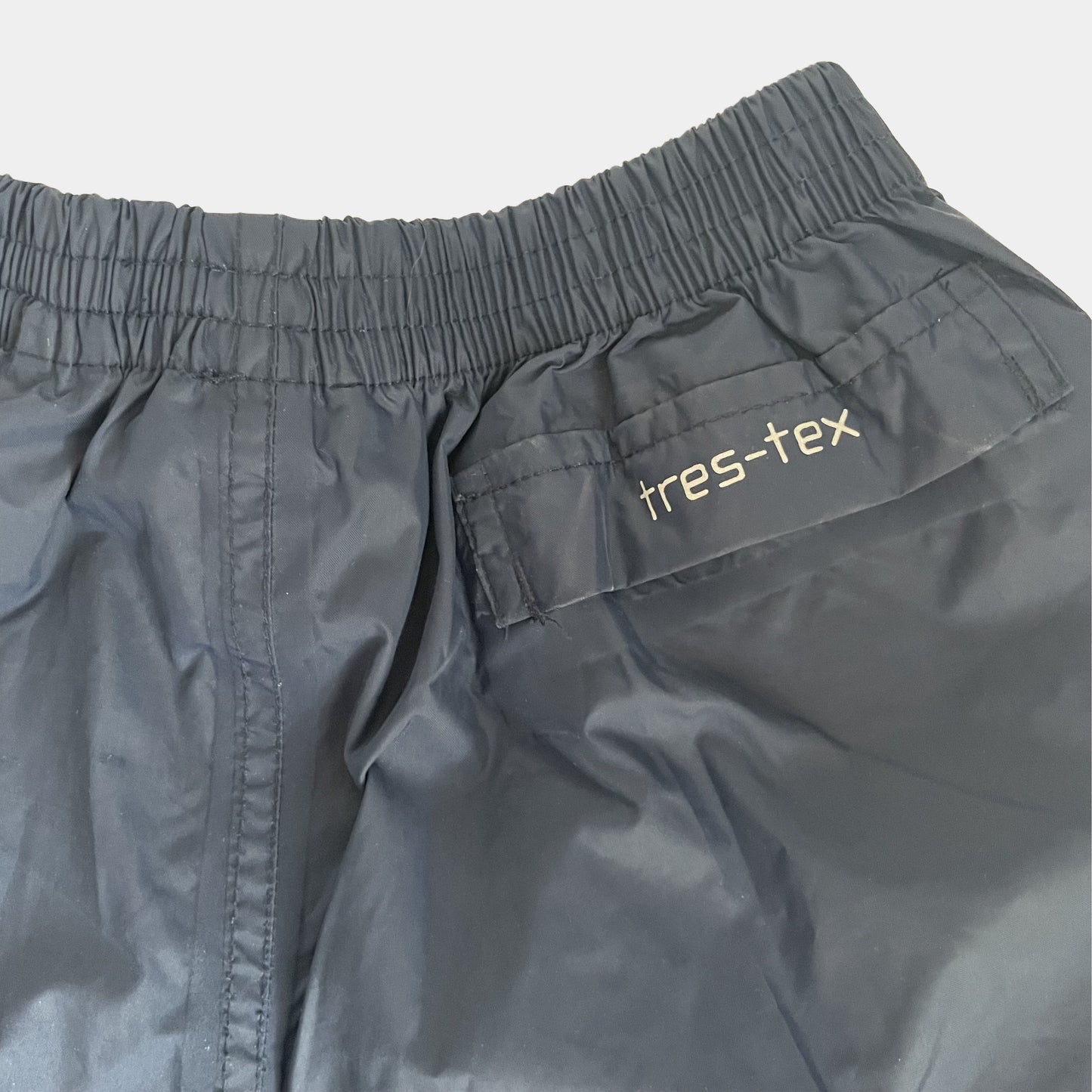 Dunkelblaue Trespass-Regenhose für Kinder, 9/10 Jahre – back