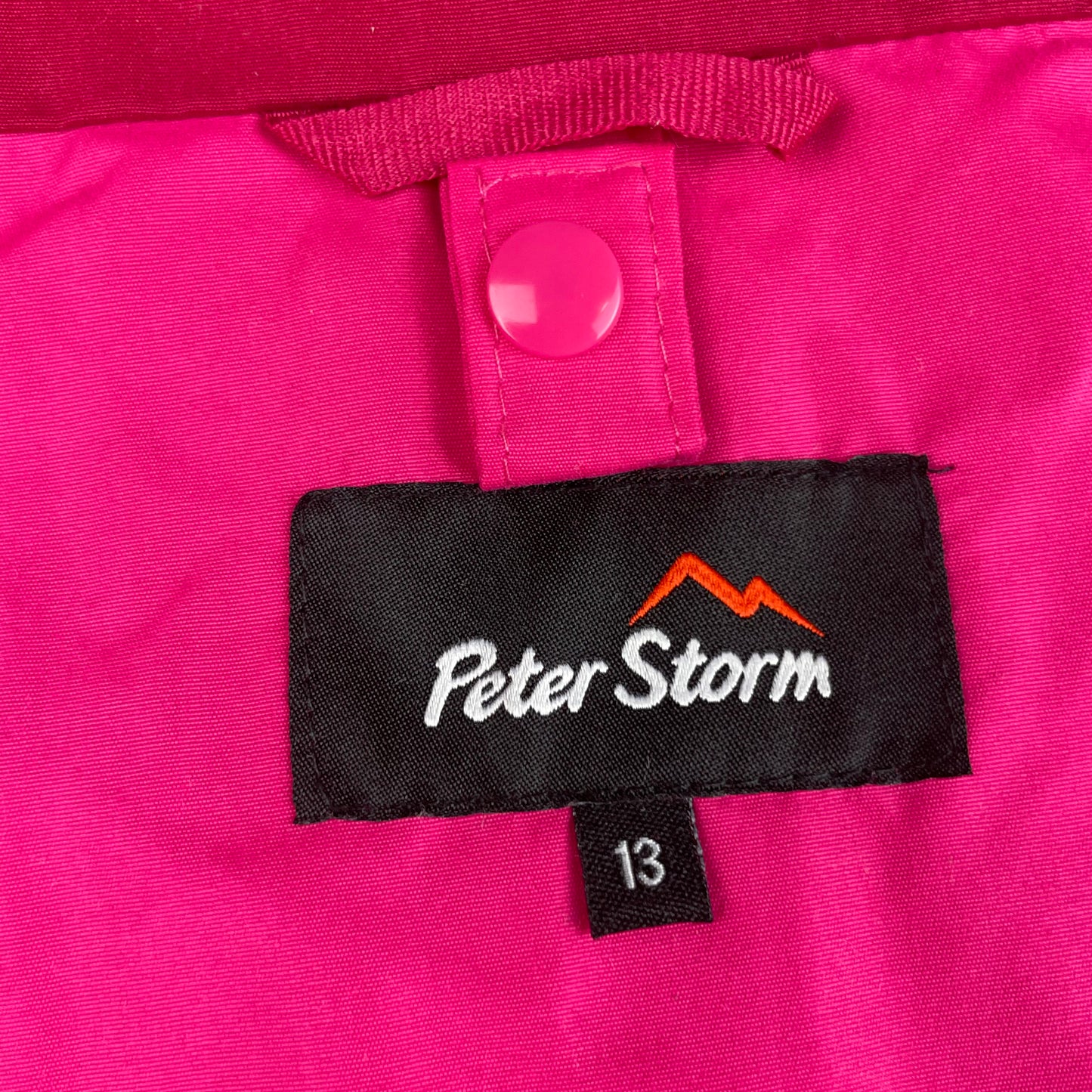 Pinke Regenjacke von Peter Storm mit Kapuze, Größe 13, aus Polyester. – label