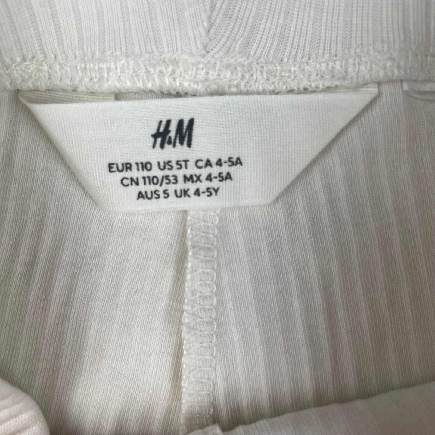 Weiße gerippte Leggings für Kinder von H&M, Größe 4-5 Jahre – label