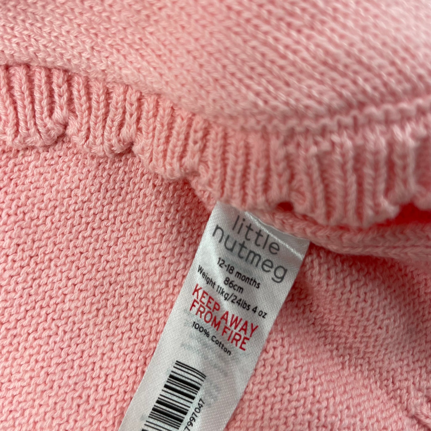 Rosa Strickjacke für Babys mit Rüschen und Knopfverschluss – label