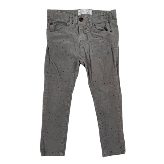 Grau gepunktete Mädchenhose mit elastischem Bund