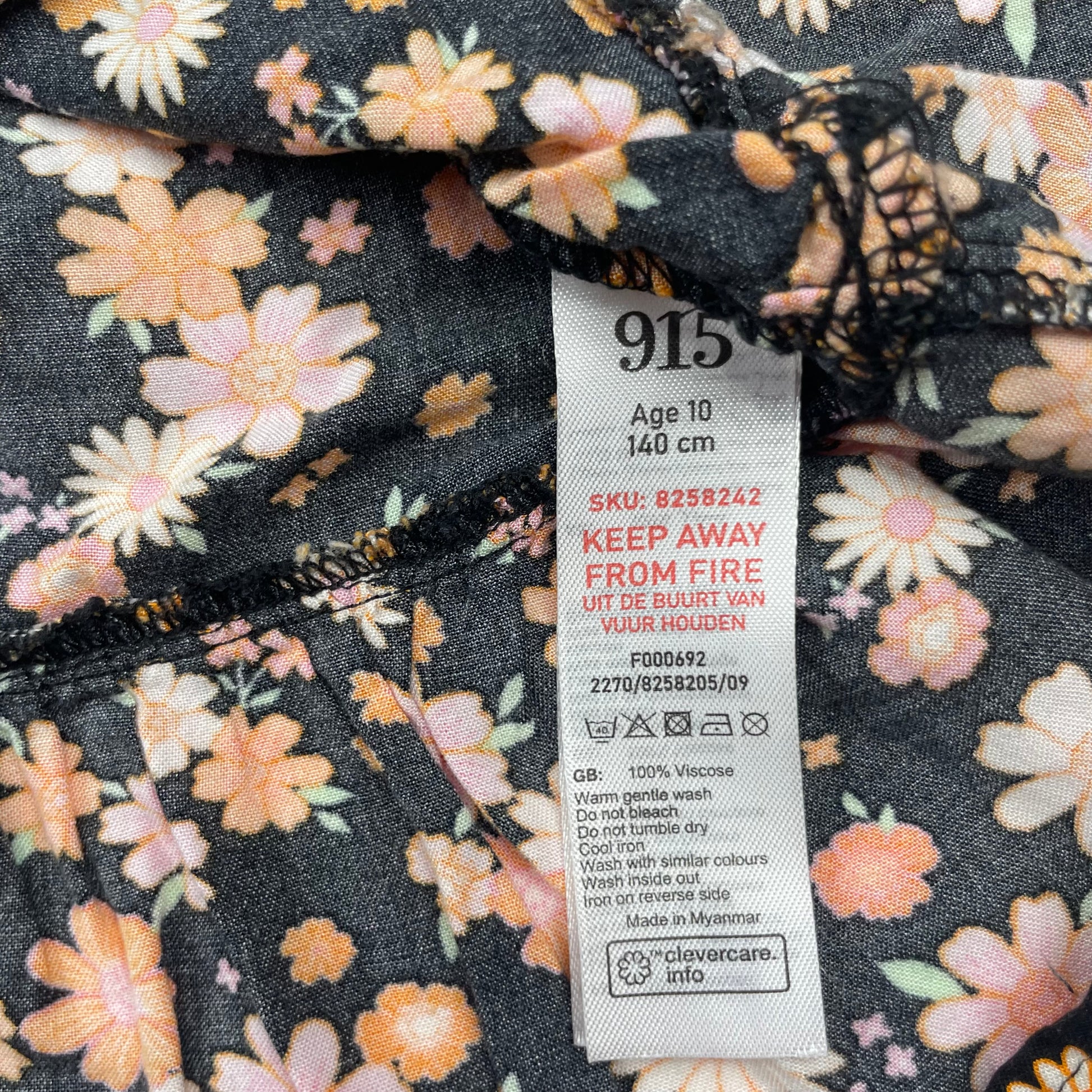 Schwarzes Viskose-Kleid mit Blumenmuster für Mädchen Größe 140 – label