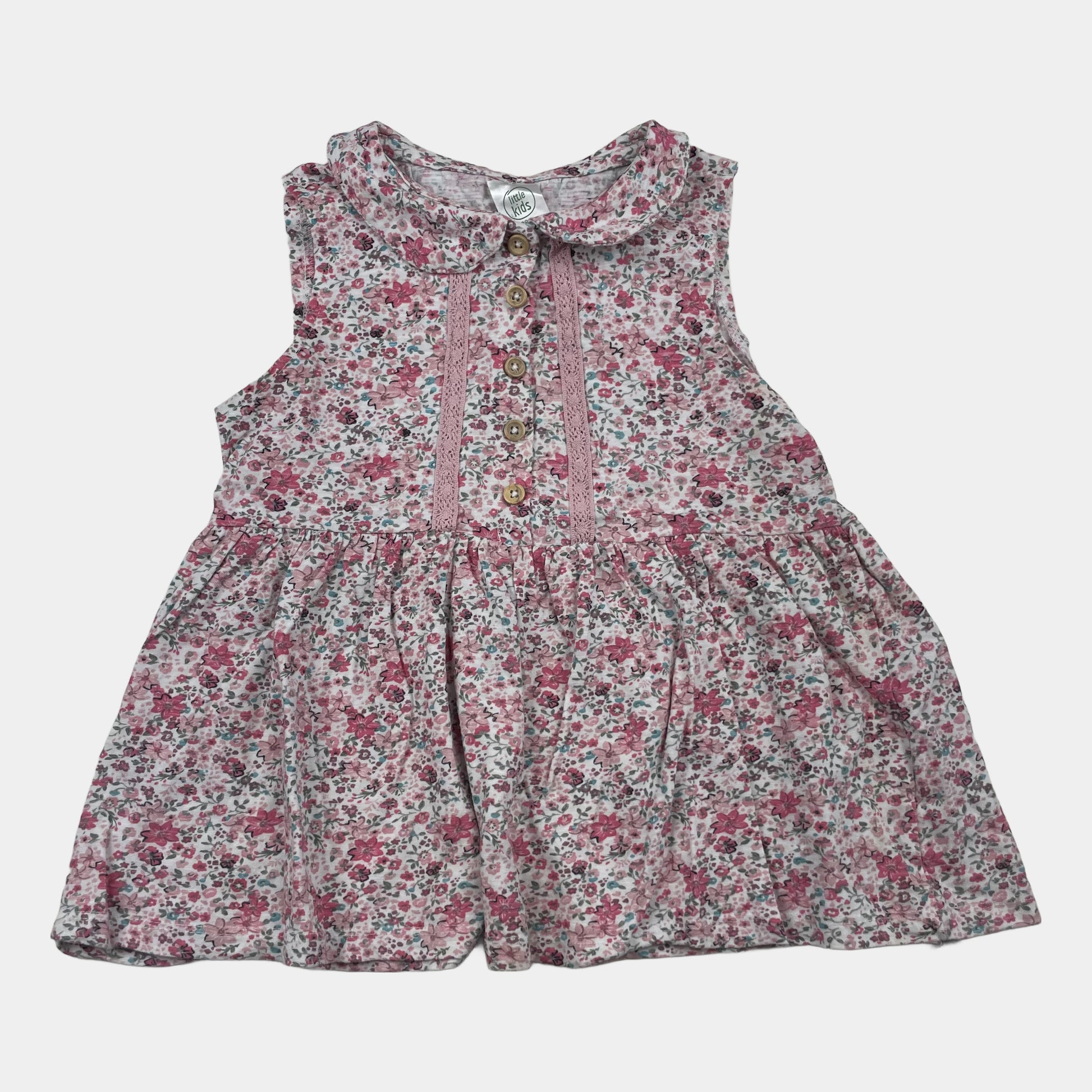 Rosa Kinderkleid mit Blumenmuster und Knopfleiste – front