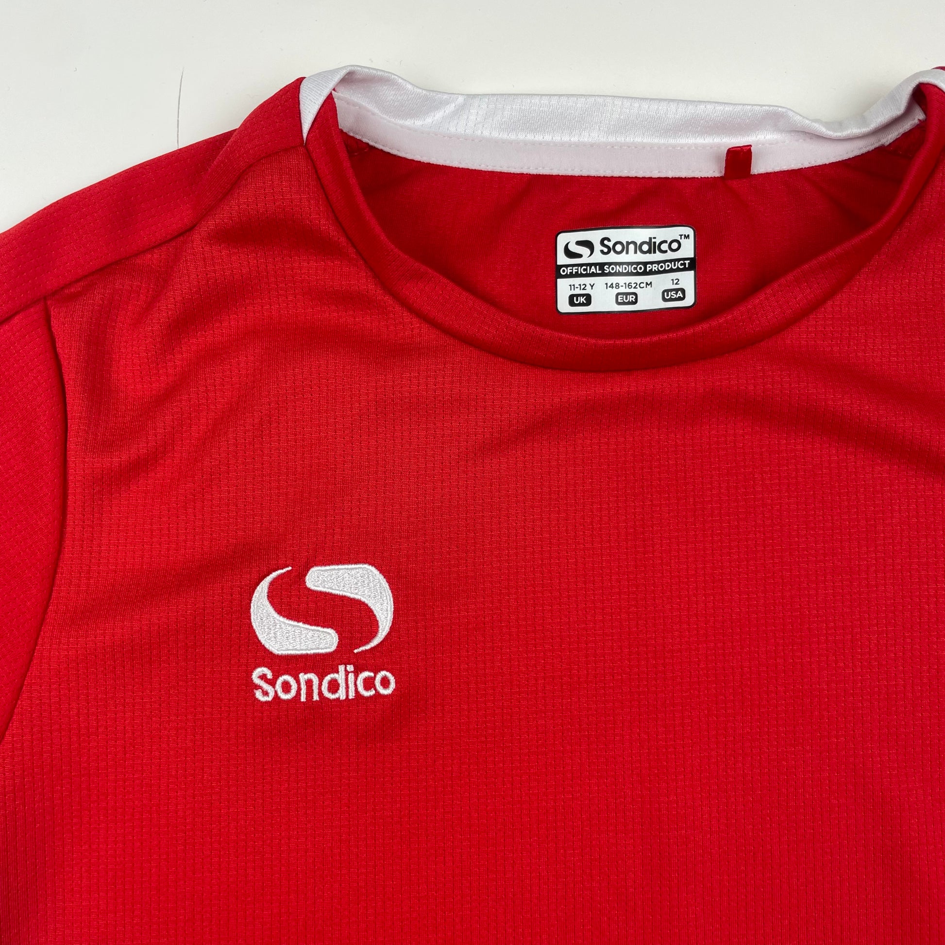 Rotes Sondico Sport-T-Shirt für Kinder mit weißen Details