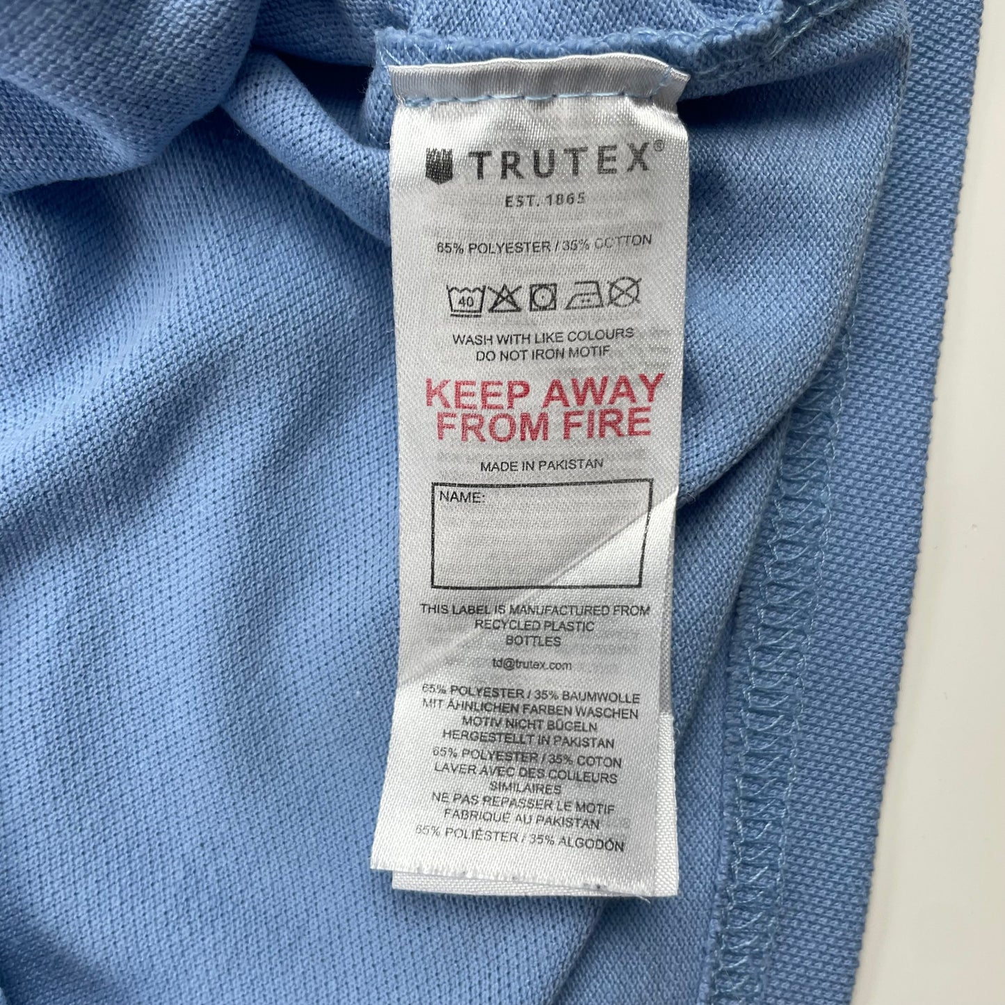 Blaues Poloshirt von Trutex in Größe 13 Jahre aus Polyester und Baumwolle – logo