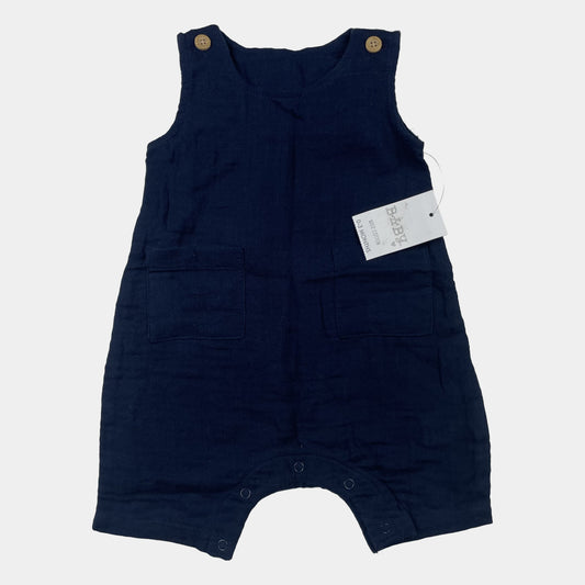 Dunkelblauer Overall für Babys mit Knöpfen und Taschen. – front