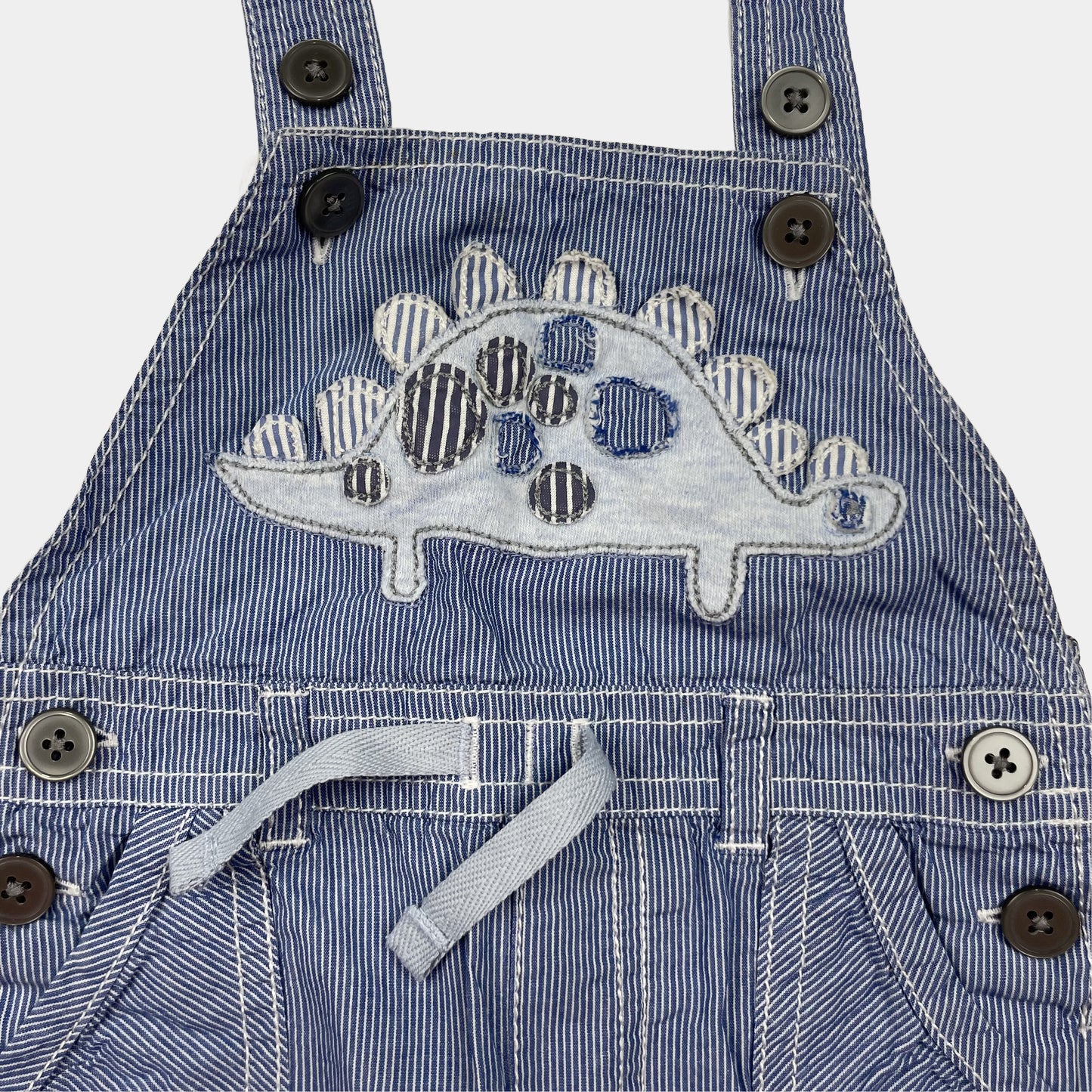 Blauer Baumwoll-Overall mit Dino-Muster für Kinder – detail