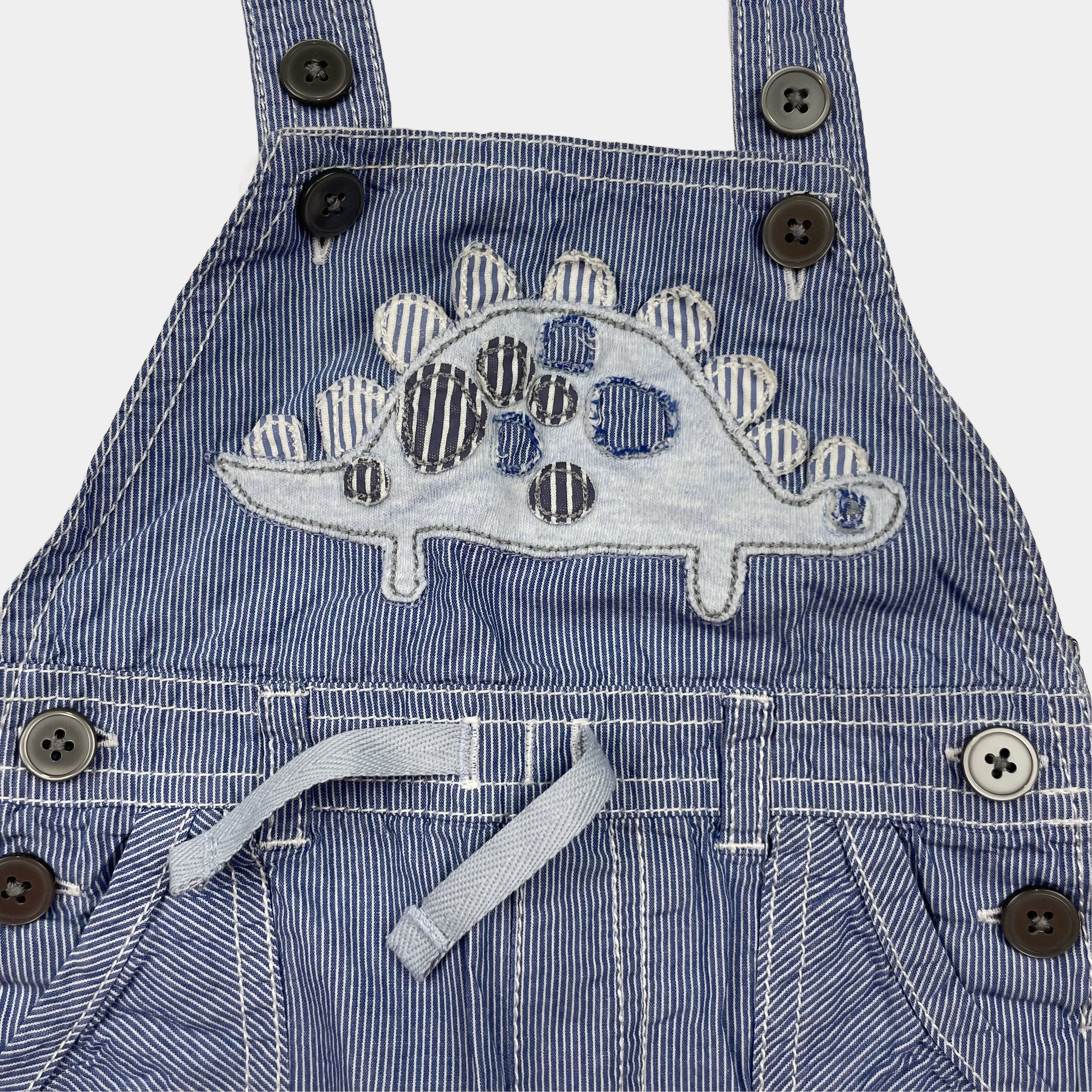 Blauer Baumwoll-Overall mit Dino-Muster für Kinder – detail