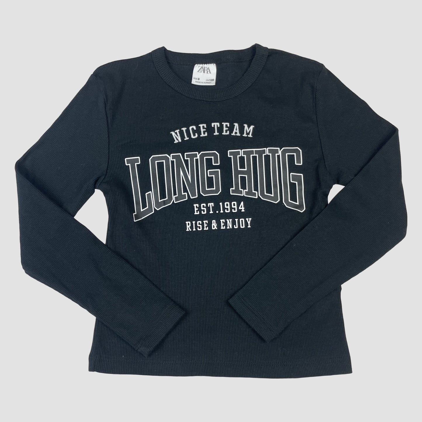 Schwarzes ZARA Langarmshirt mit Schriftzug „LONG HUG“, Größe 128 – front