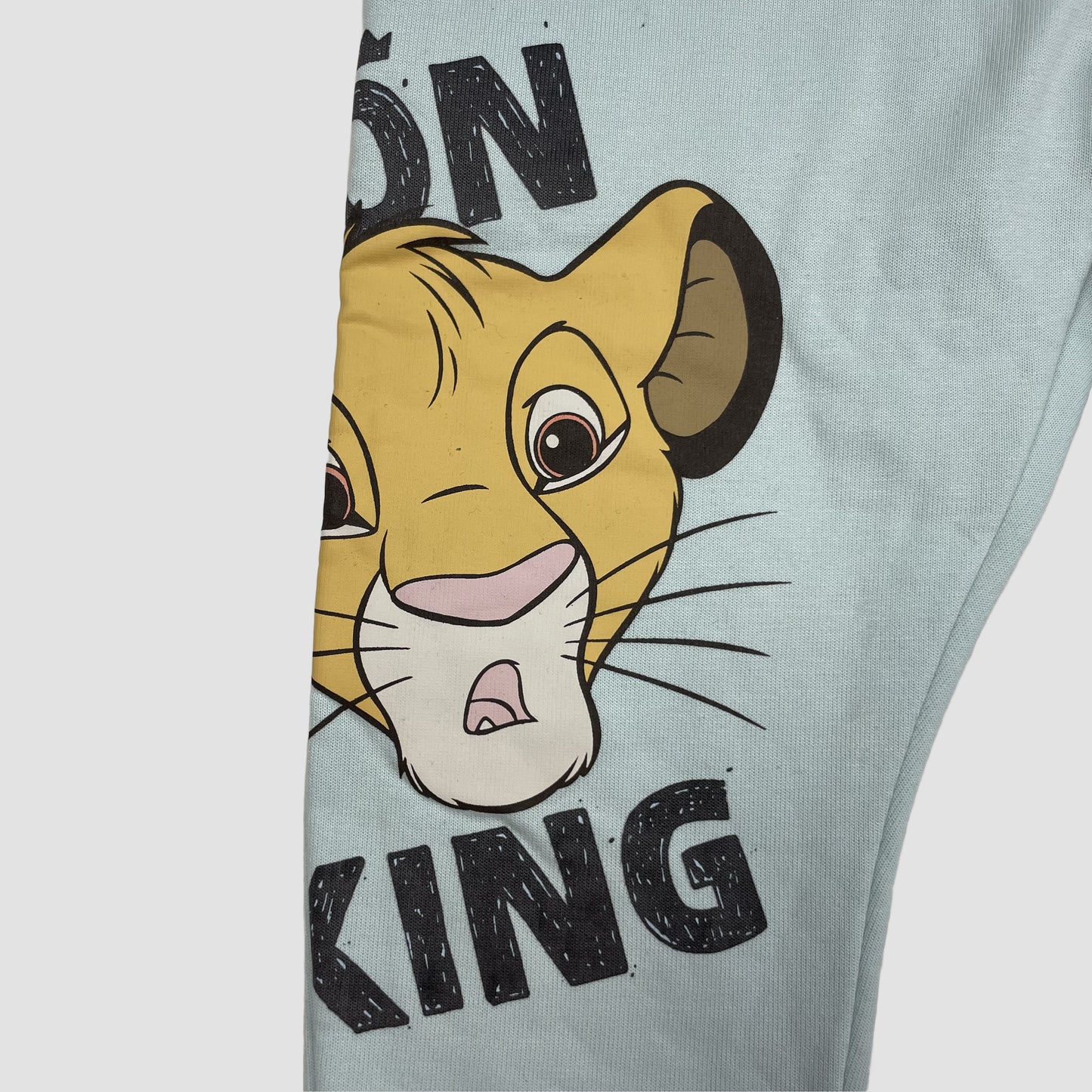 Mintgrüne Jogginghose mit Simba-Print von Primark Disney, Größe 18–24 Monate – detail