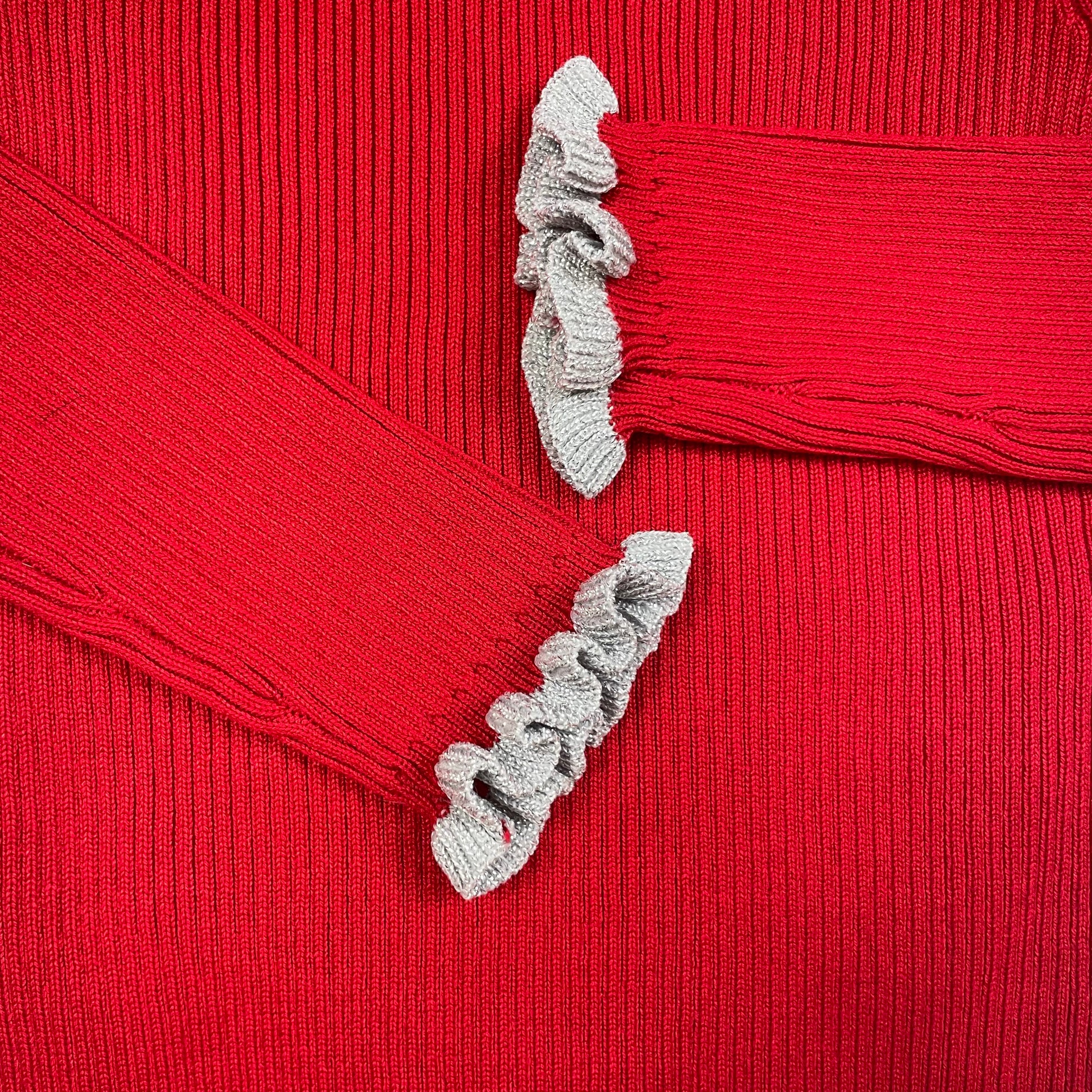 Roter Rollkragenpullover für Kinder aus Rippstrick von Primark – detail