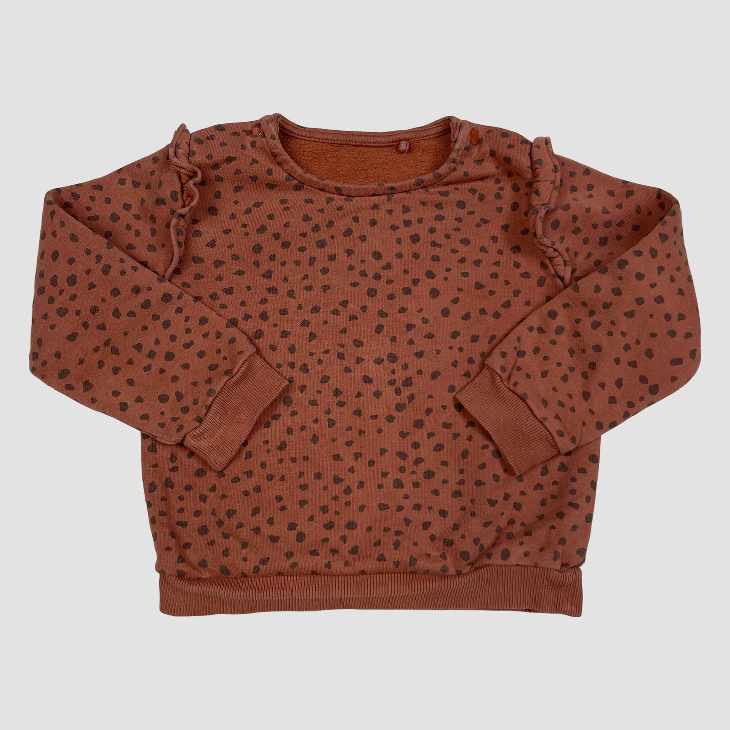 Rostbrauner Kinderpullover mit schwarzen Punkten und Rüschen, Größe 12–18 Monate