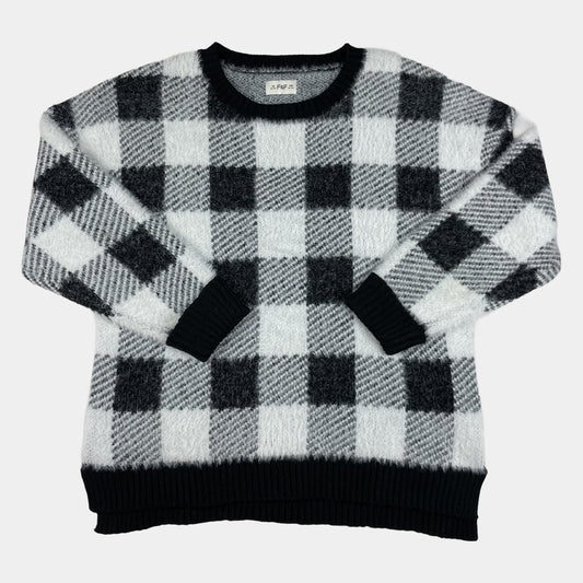 Flauschiger Kinderpullover mit schwarz-weißem Karomuster, Rundhals und Rippbündchen – front