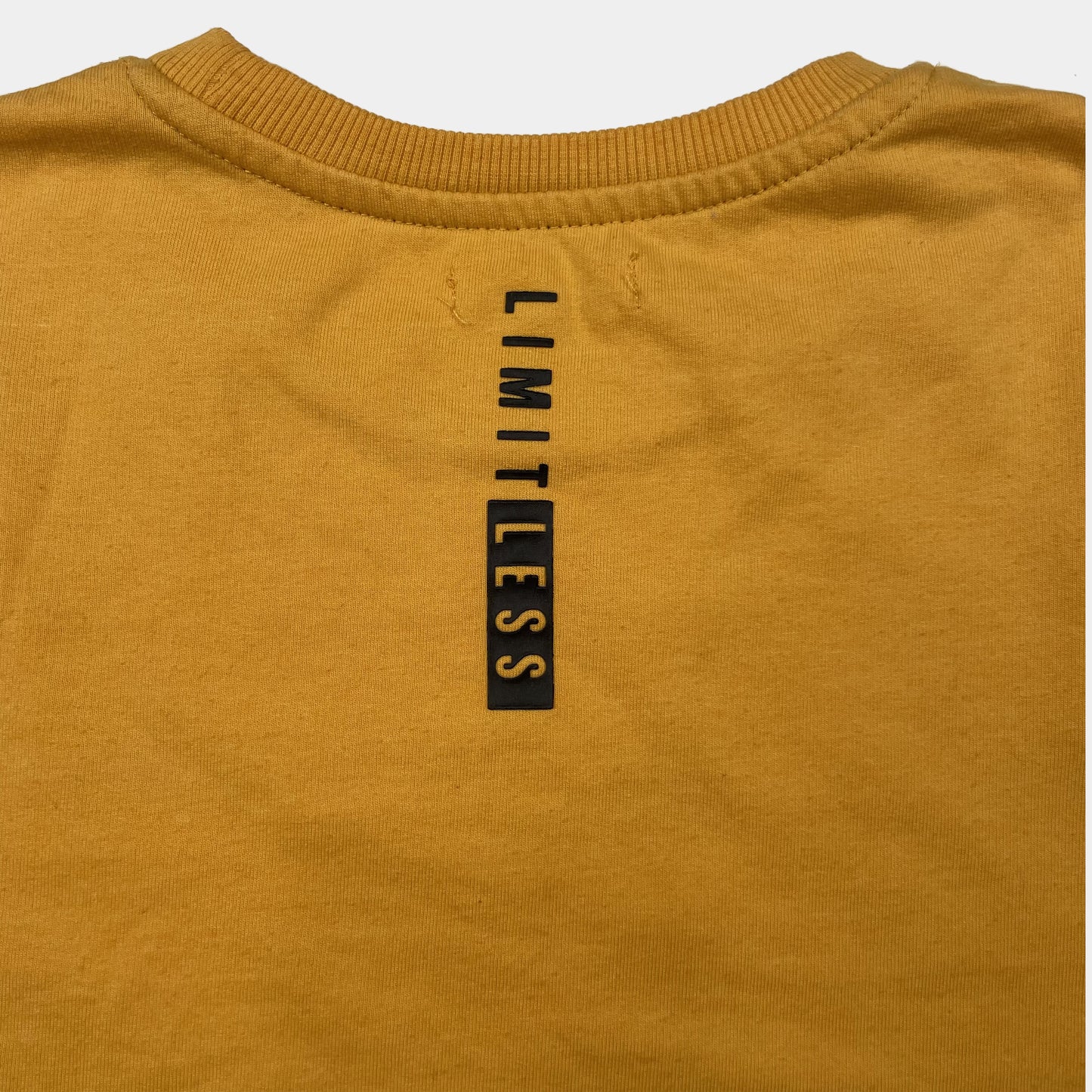 Gelbes Kinder-Sweatshirt mit LIMITLESS-Print und weißem Saumeinsatz, Größe 11–12 Jahre – back
