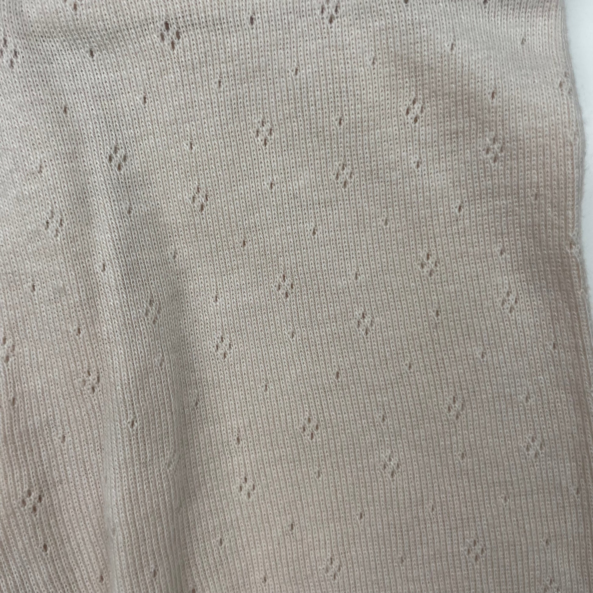 Beige Babyhose aus Baumwolle mit Pointellemuster und Umschlagbündchen – detail