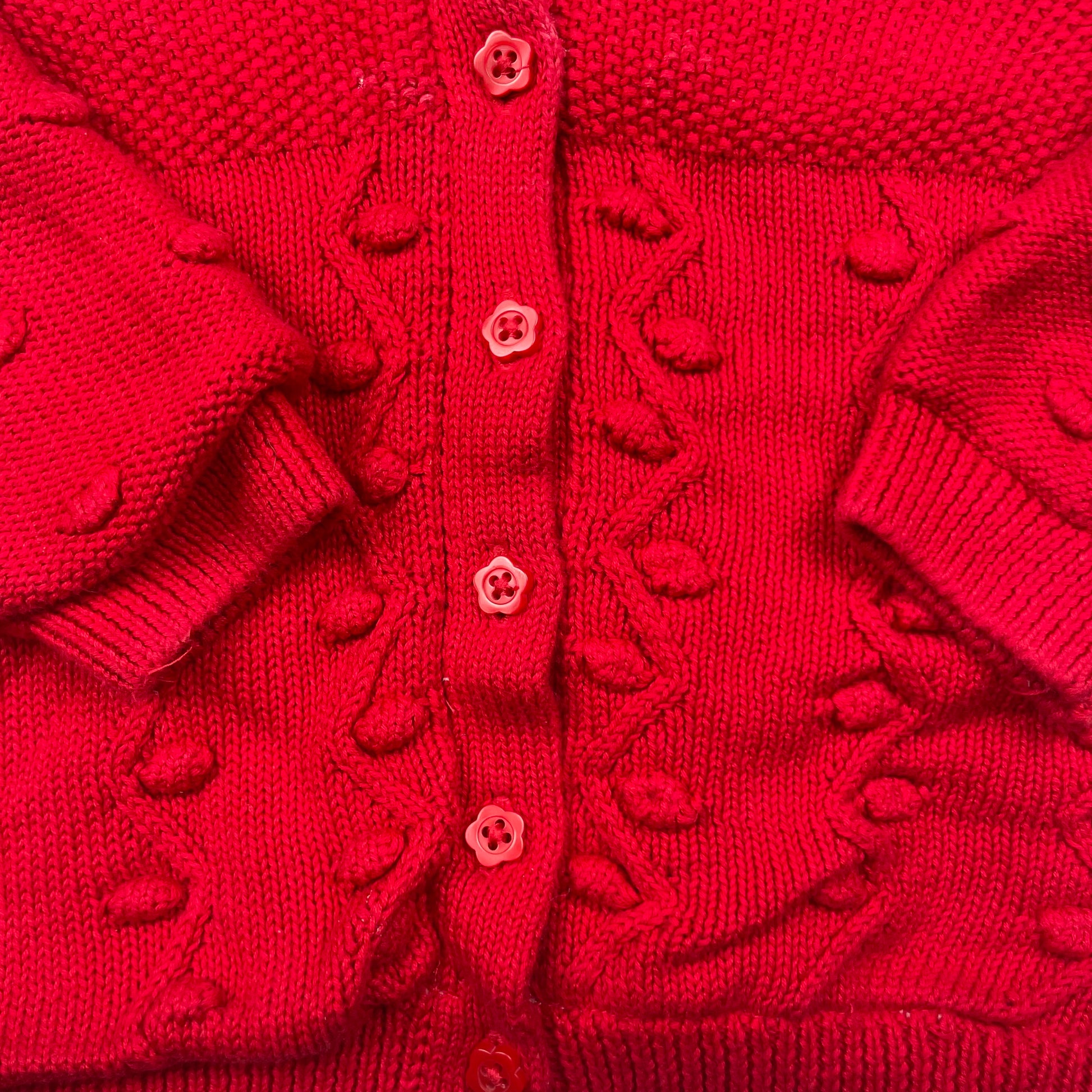 Rote Kapuzen-Strickjacke mit Noppen und Quaste, Größe 6–9 Monate