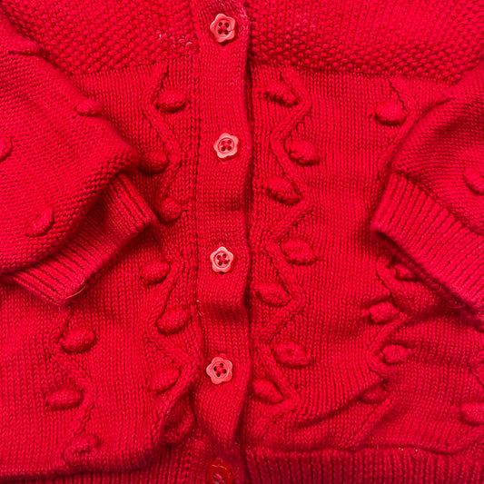 Rote Kapuzen-Strickjacke mit Noppen und Quaste, Größe 6–9 Monate