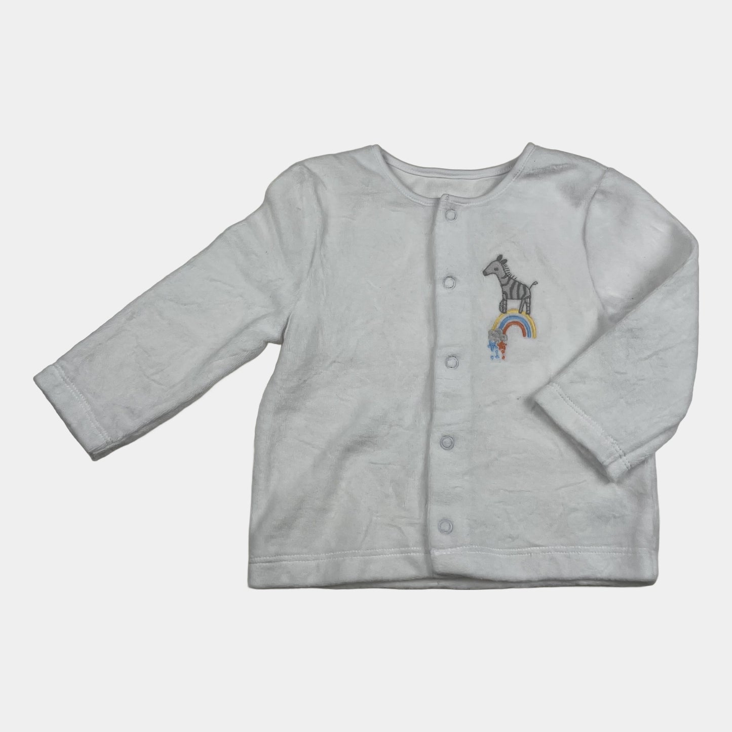 Weiße Jacke mit Zebra-Motiv und Knopfleiste für Babys. – front