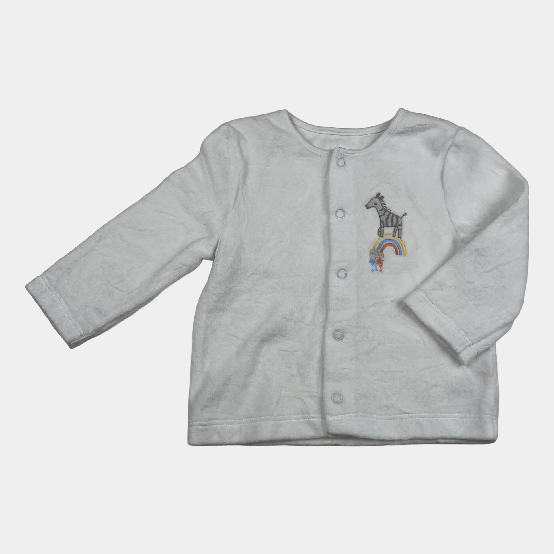Weiße Jacke mit Zebra-Motiv und Knopfleiste für Babys. – front