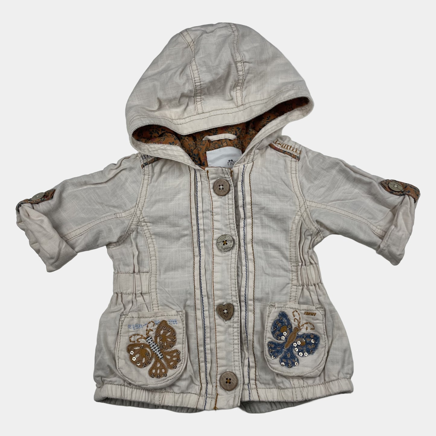 Beige Kapuzenjacke mit Schmetterlingsmotiven auf den Taschen – front