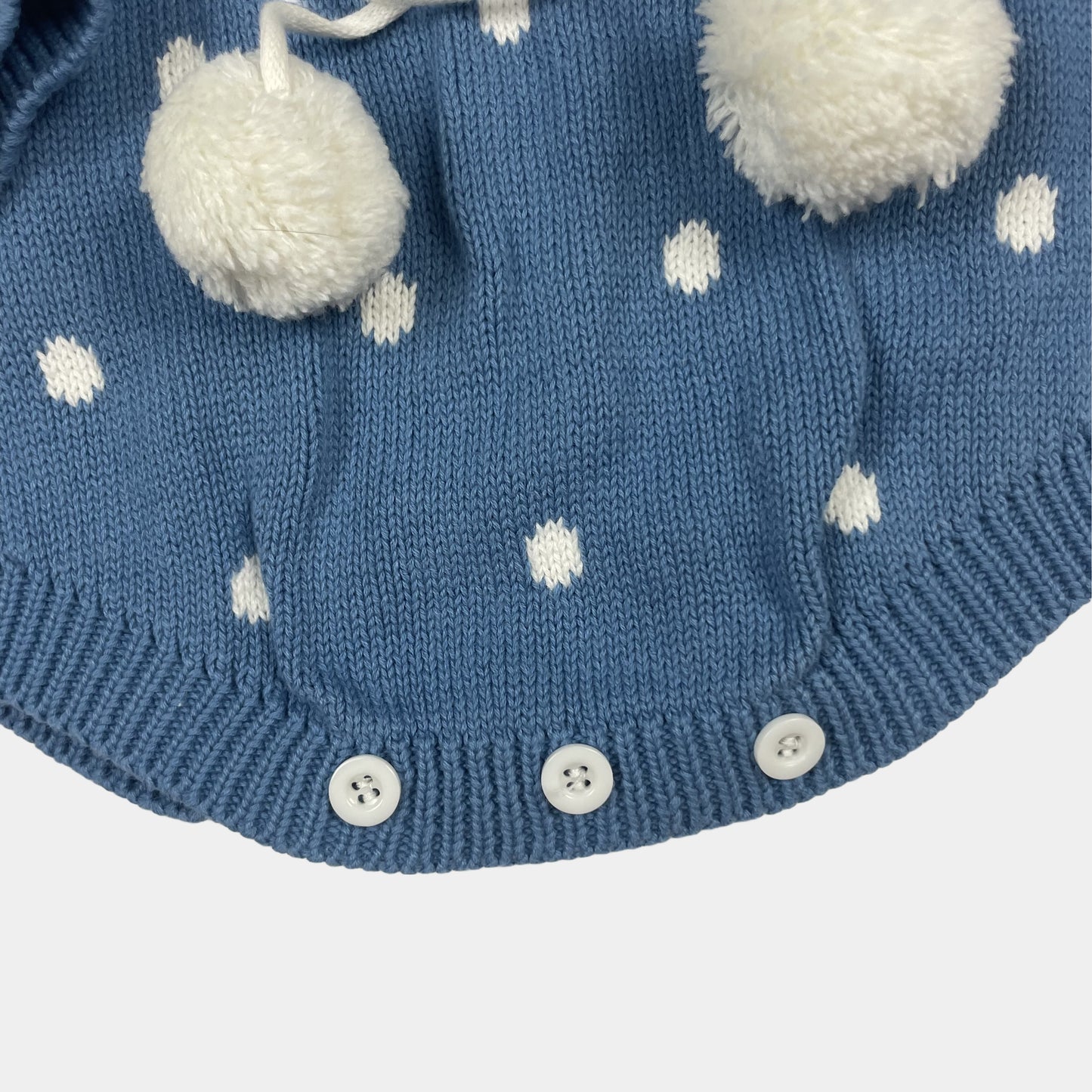 Blauer Baumwolloverall mit Punktmuster und Krempelkragen – detail