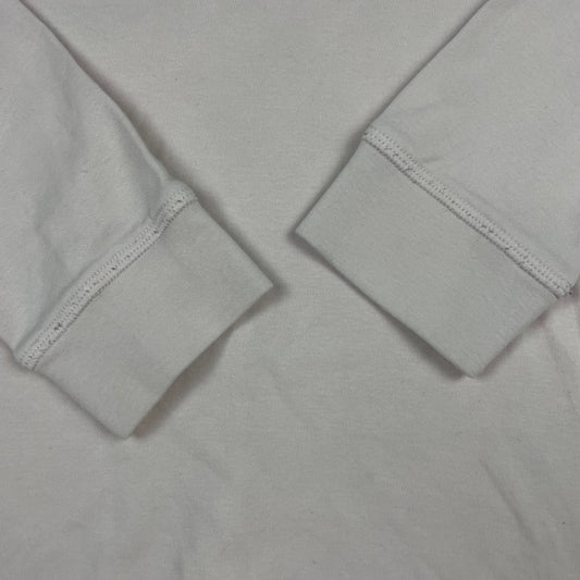 Rosa Langarmshirt aus Baumwolle mit klassischem Rundhalsausschnitt. – detail