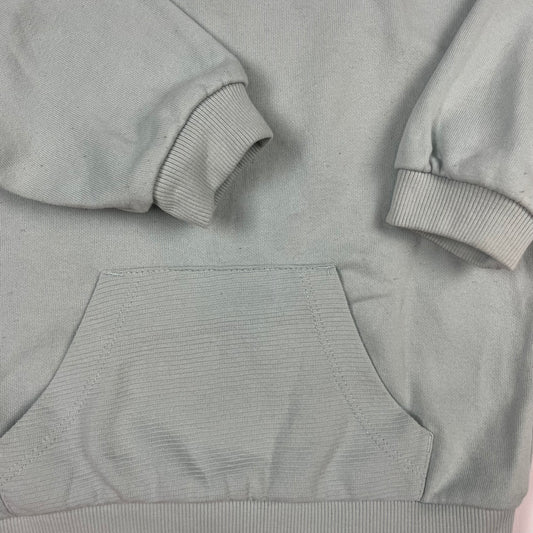 Hellgrüner Sweatshirt mit Tasche, geeignet für Kinder von 12-18 Monaten – detail