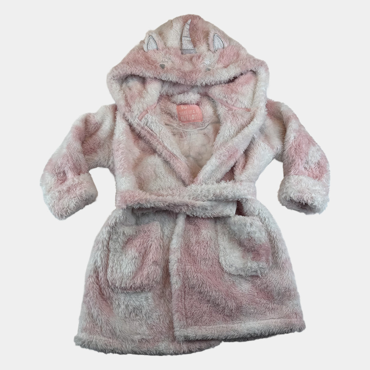Rosa-weißer Kinder-Bademantel aus Fleece mit Einhorn-Kapuze, Bindegürtel und Taschen – front