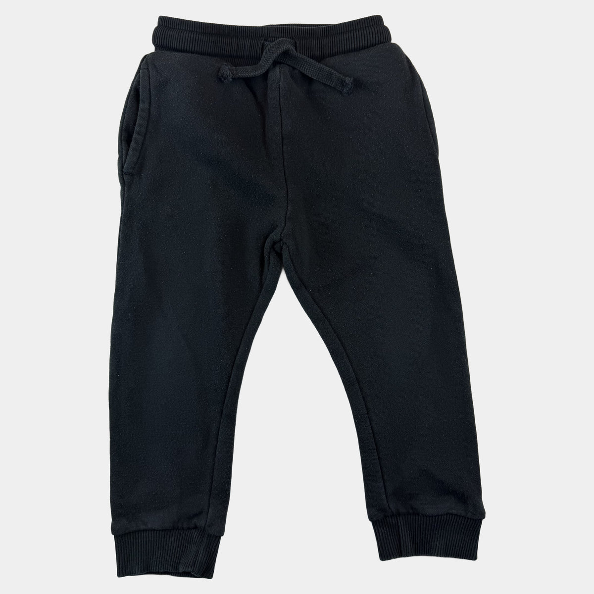 Schwarze Kinder-Sweathose mit Kordelzug und Bündchen – front