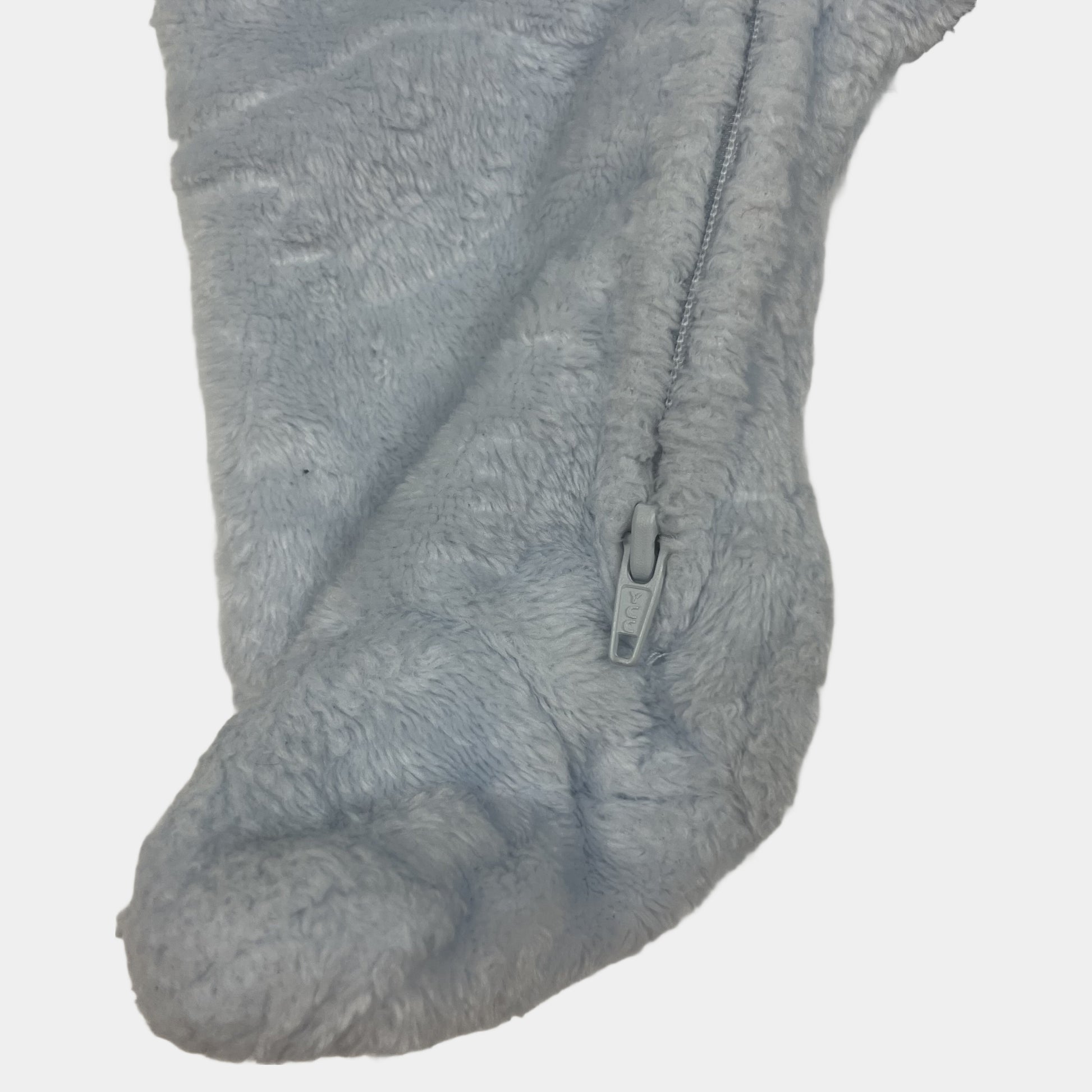 Blauer Fleece-Overall mit Dinosaurier-Motiv