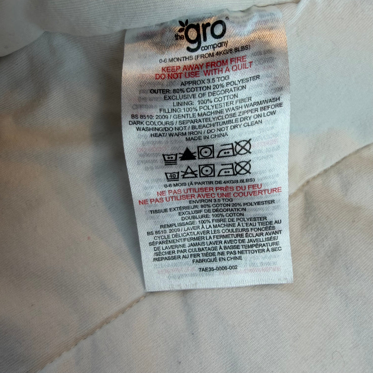 Weißer Baby-Schlafsack mit türkisfarbenem Pinguin-Motiv und Reißverschluss – label
