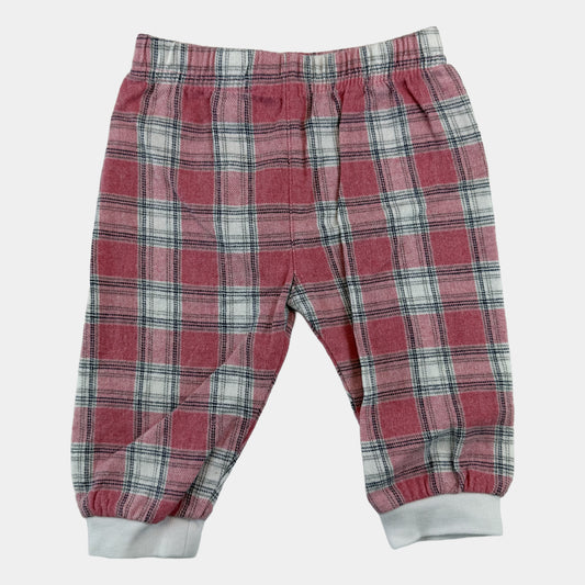 Rosa karierte Babyhose mit elastischem Bund und weißen Bündchen – front
