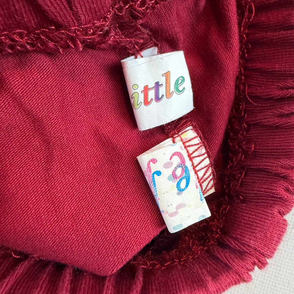 Bordeauxrote Kinderhose aus Jersey mit elastischem Bund – label