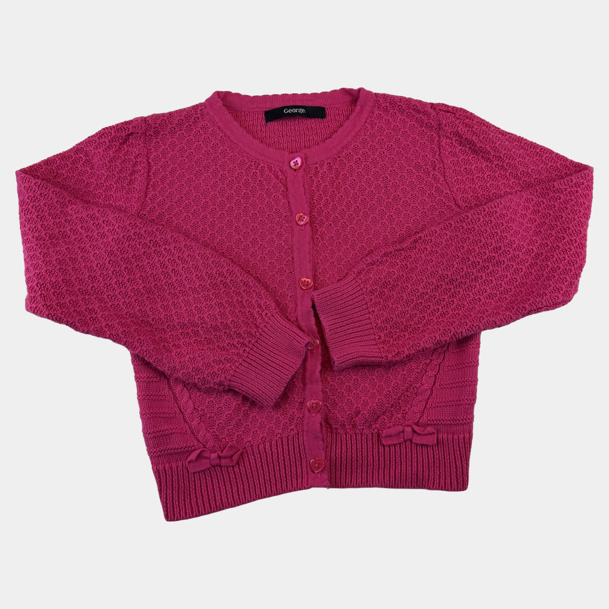 Pinke Strickjacke für Kinder mit Knopfleiste und Schleifen-Details – front