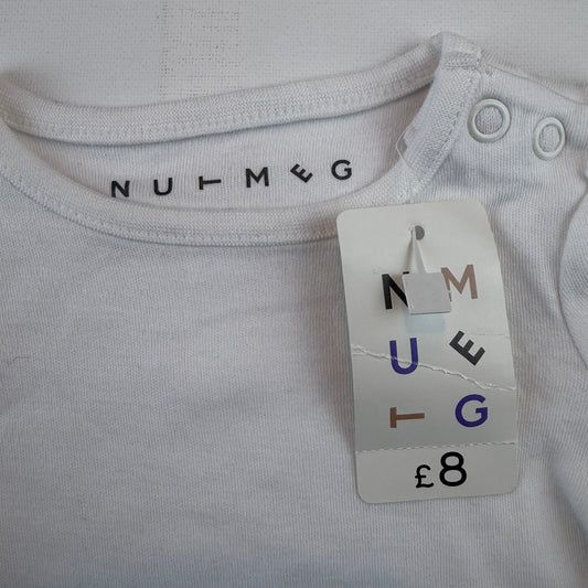 Weißes Baby-Langarmshirt mit Puffärmeln und Schulterknöpfen – detail