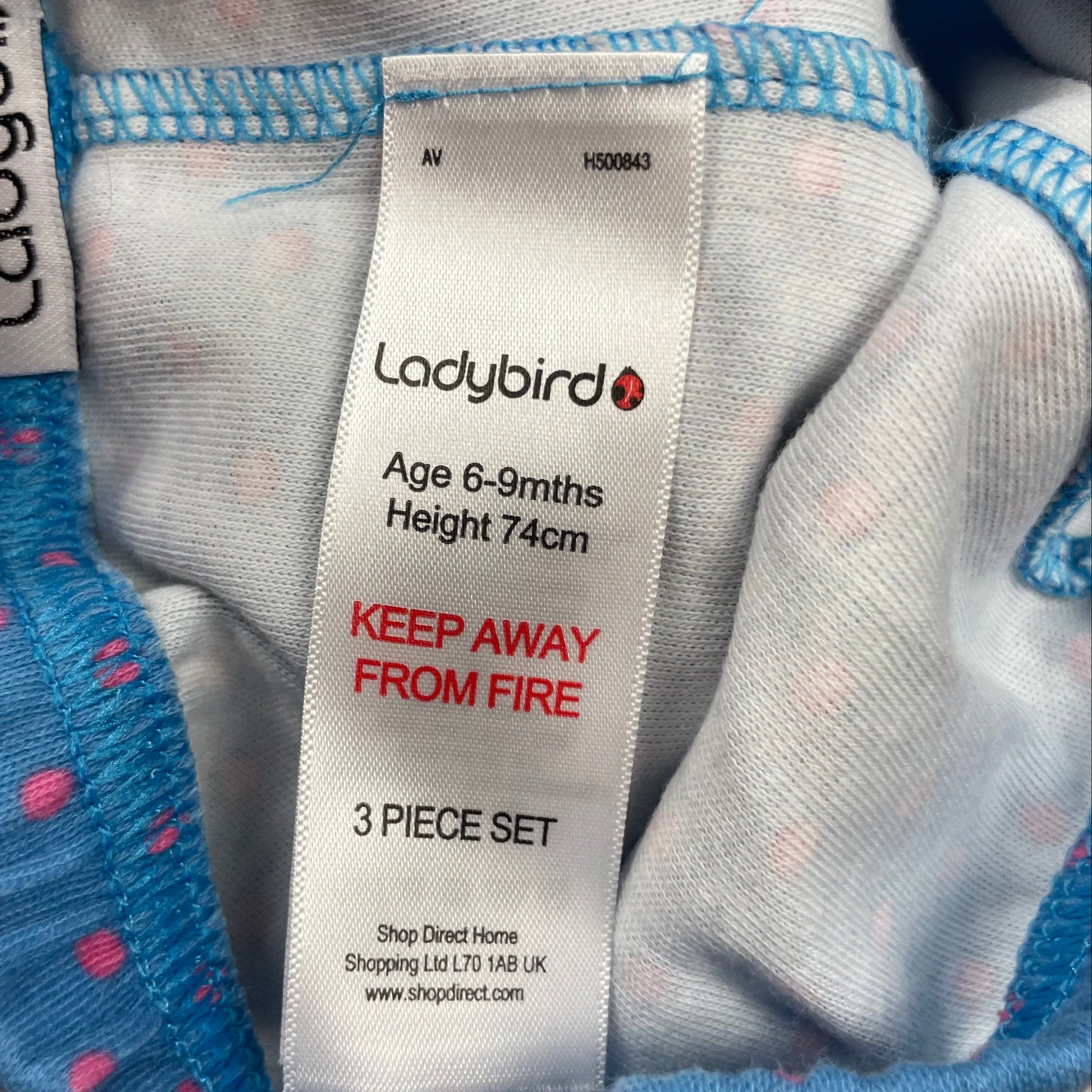 Blaue Baumwollhose mit rosa Punktemuster für Babys, elastischer Bund, Größe 6-9 Monate, von Ladybird. – detail