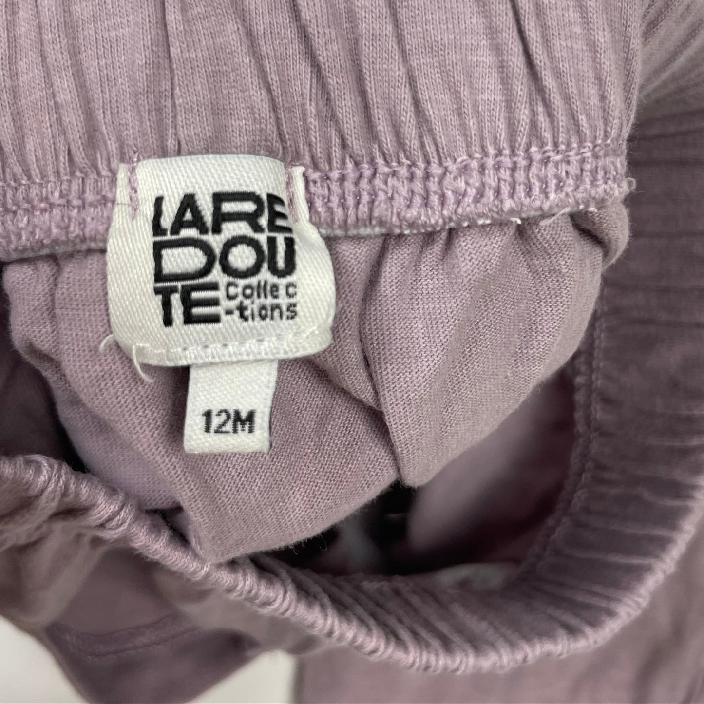 Lila Baumwollhose mit elastischem Bund und Taschen – logo