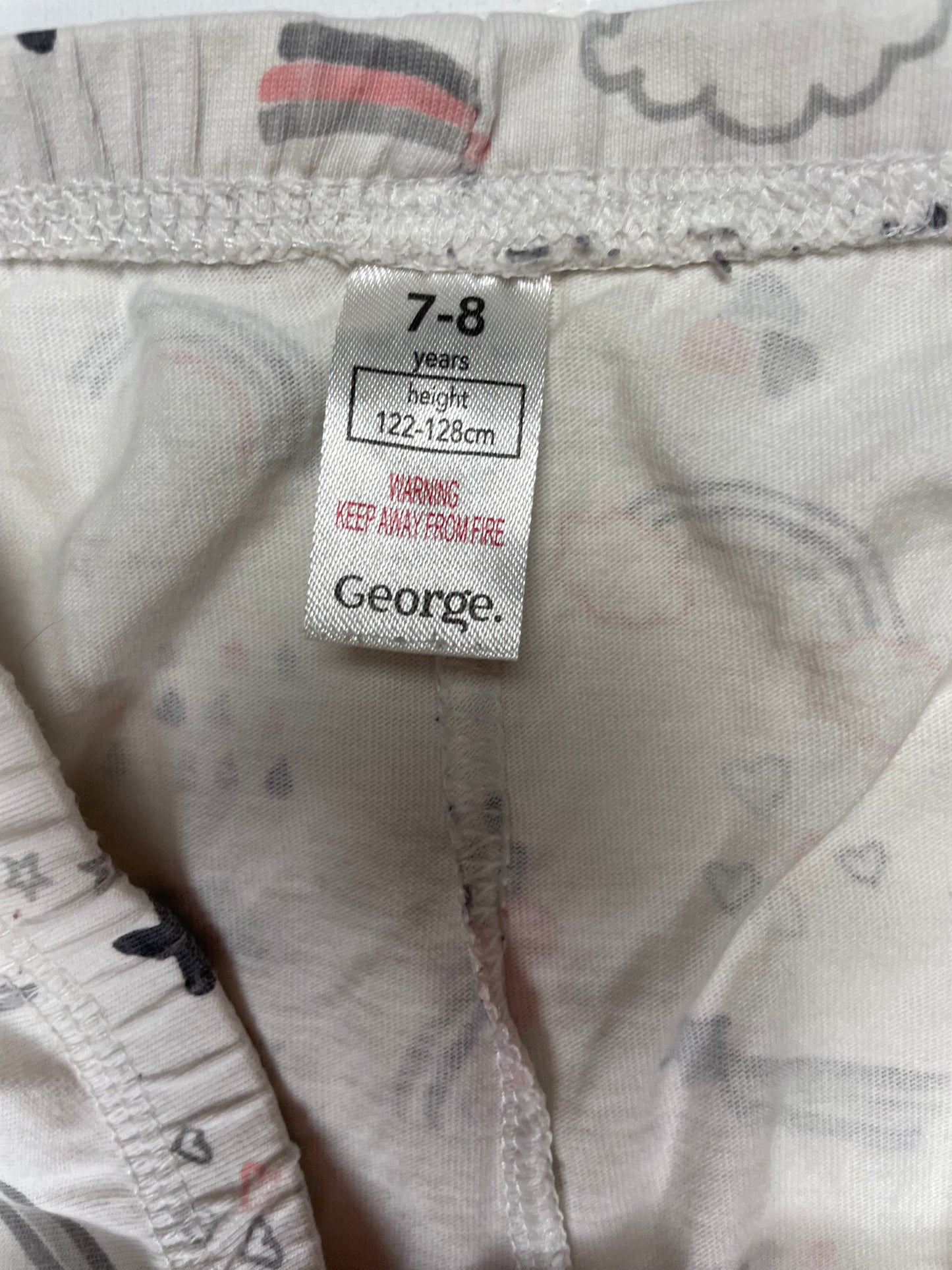 Weiße Schlafanzughose mit Regenbogenmuster für 7-8 Jahre – label