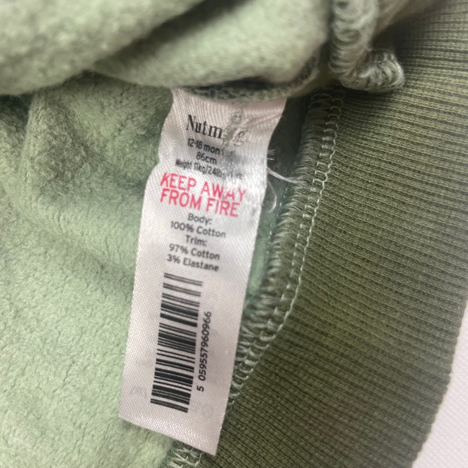 Camouflage Pullover mit Schriftzug 'CHEEKY CHOPS' – label