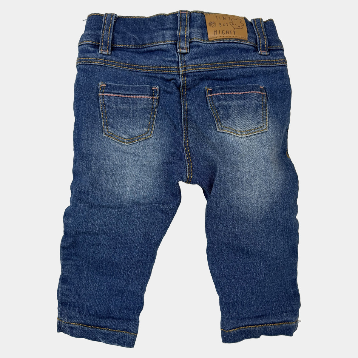 Blaue Baby-Jeans mit Tiergesichtern als Knie-Applikationen und elastischem Bund – back
