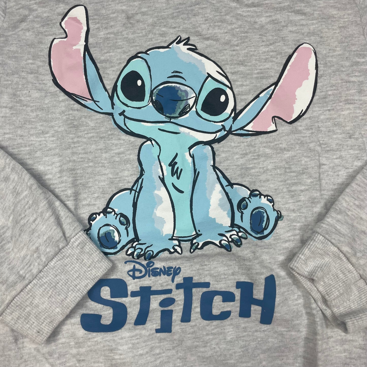 Grauer Pullover mit Kapuze und Disney-Stitch-Logo-Aufdruck – detail