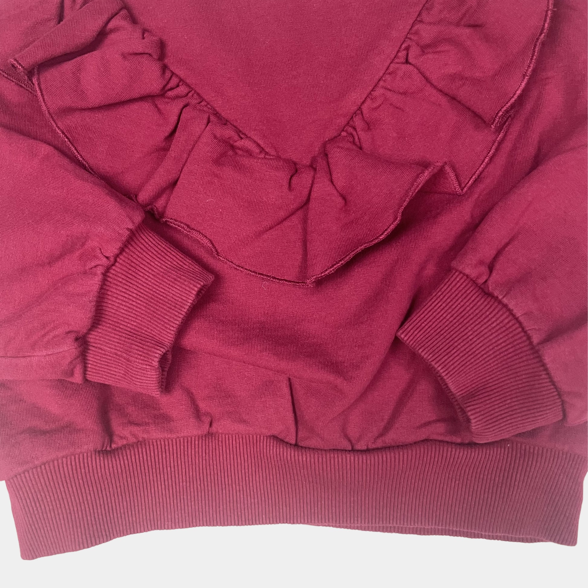 Pflaumenfarbener Pullover mit Rüsche für Kinder – detail