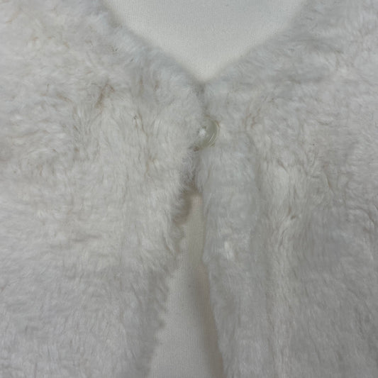 Weiße Flanellweste mit flauschiger Textur für Kinder – detail