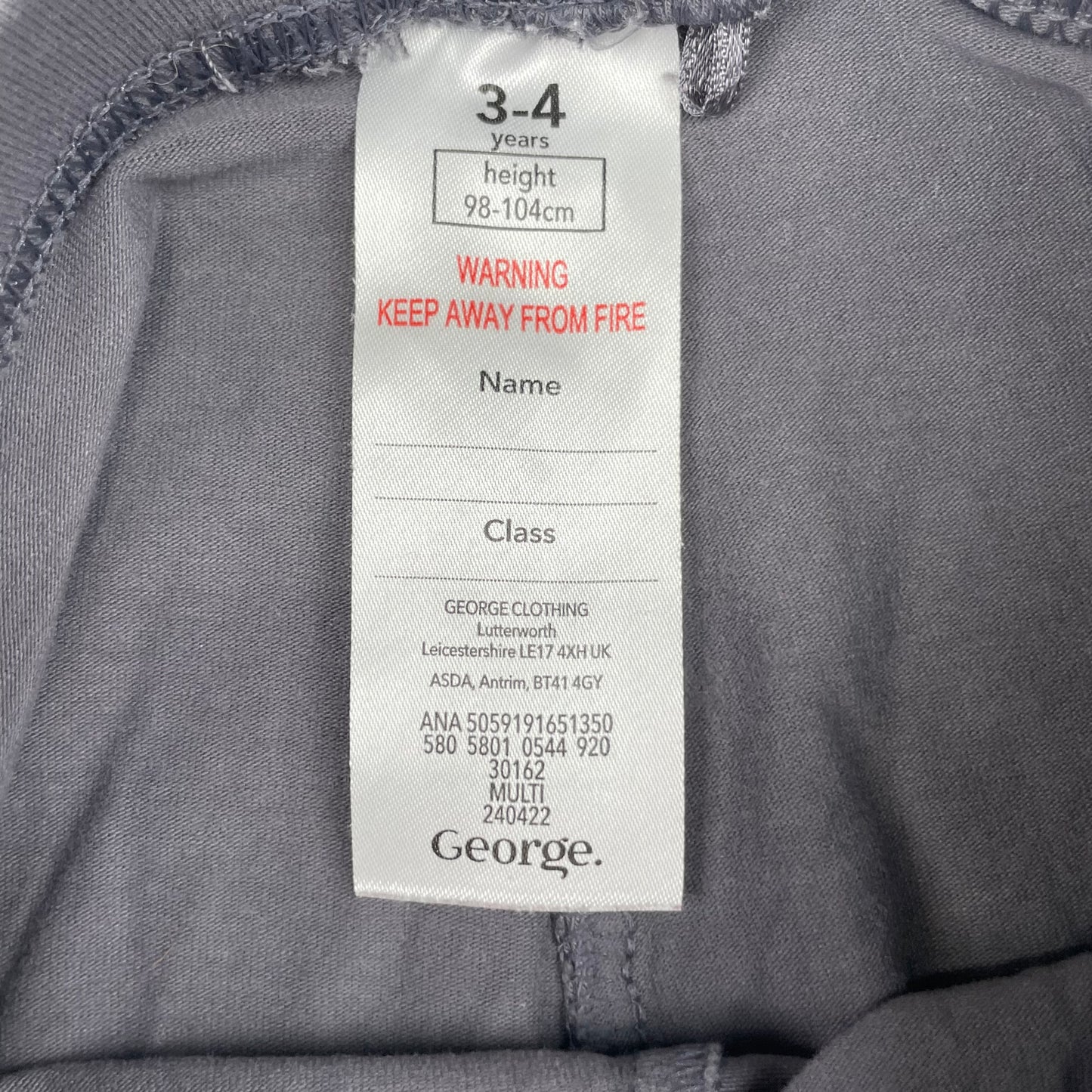 Graue Leggings aus Baumwolle mit elastischem Bund. – label