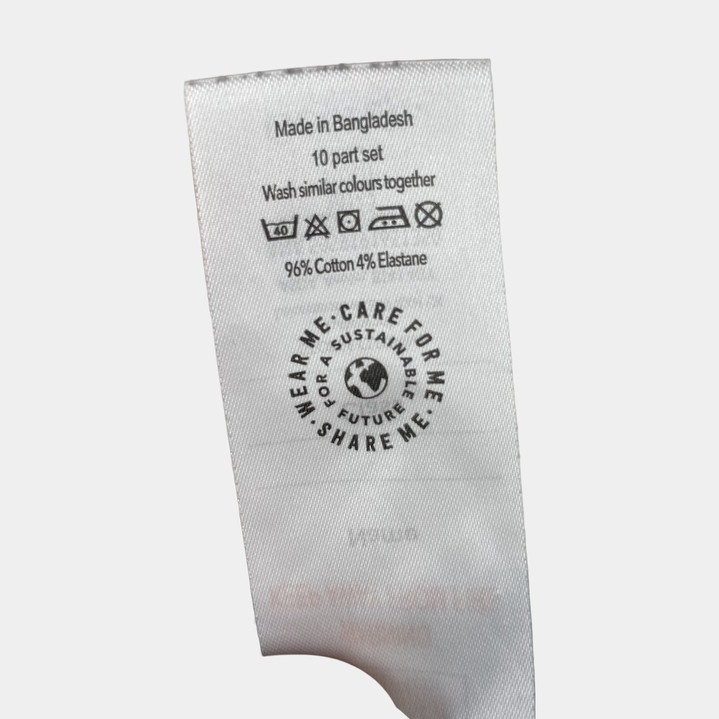 Graue Leggings aus Baumwolle mit elastischem Bund.